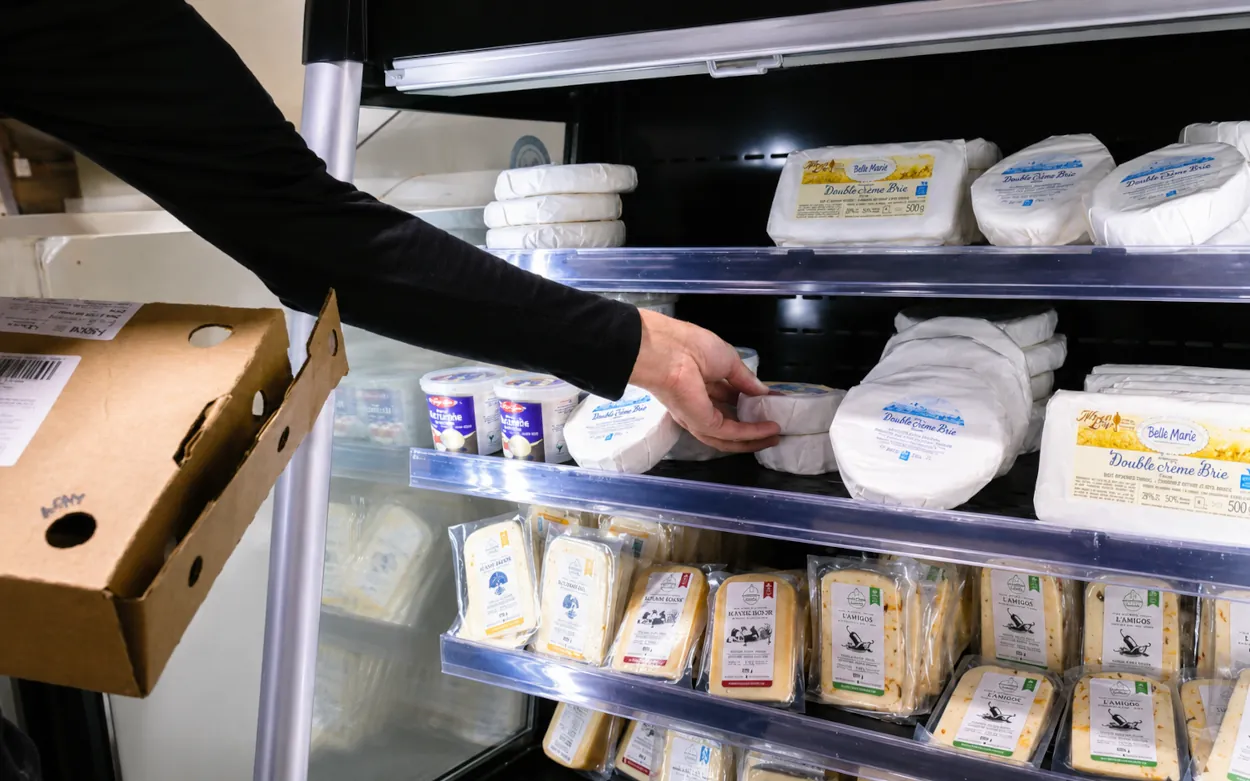 A well stocked fridge with artisan cheese at the Ontario Cheese Festival, 2025.